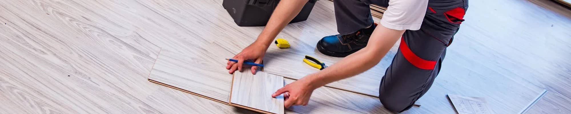 Flooring contractor installing Laminate floor from Floor Systems in Lisbon, ME