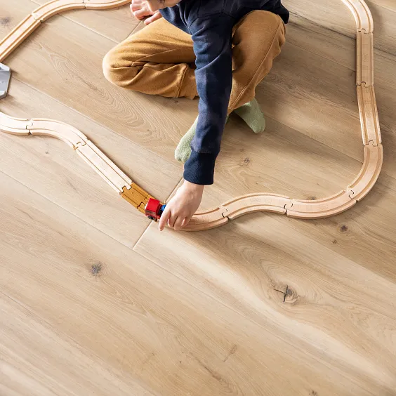 Child playing on COREtec Noise Reduction floors