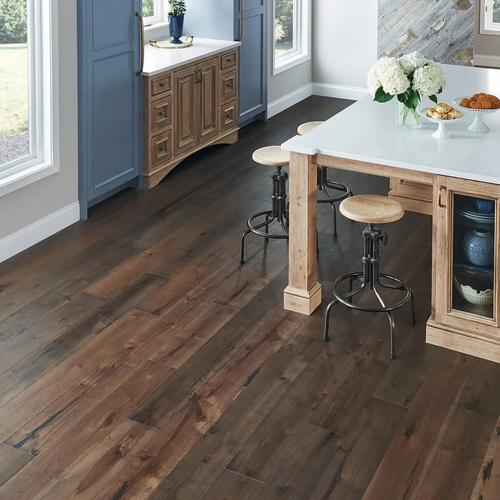 Dark hardwood flooring in a bright kitchen | Floor Systems in Lisbon, ME