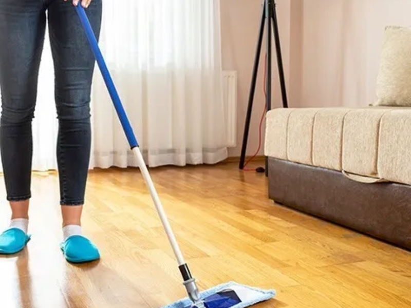 Mopping laminate floor from Floor Systems in Lisbon, ME